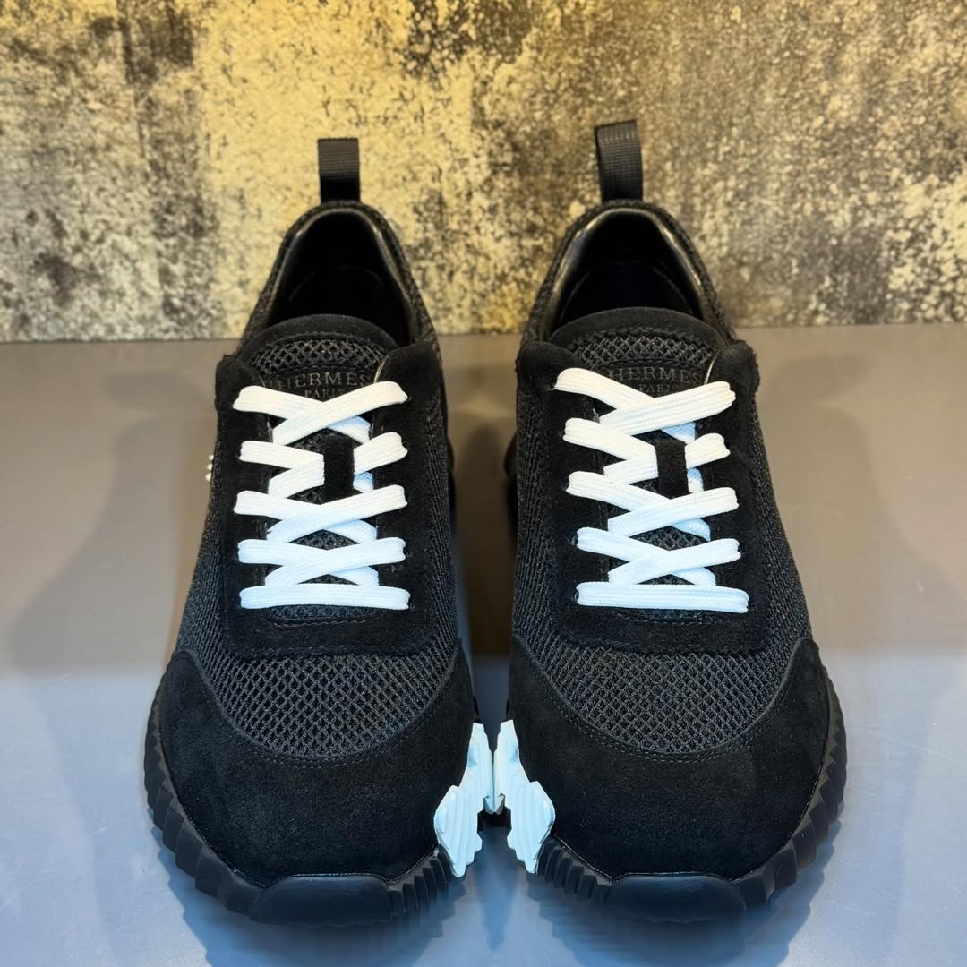 Hermés Bouncing Sneakers in Black with a White H Logo On The Heel