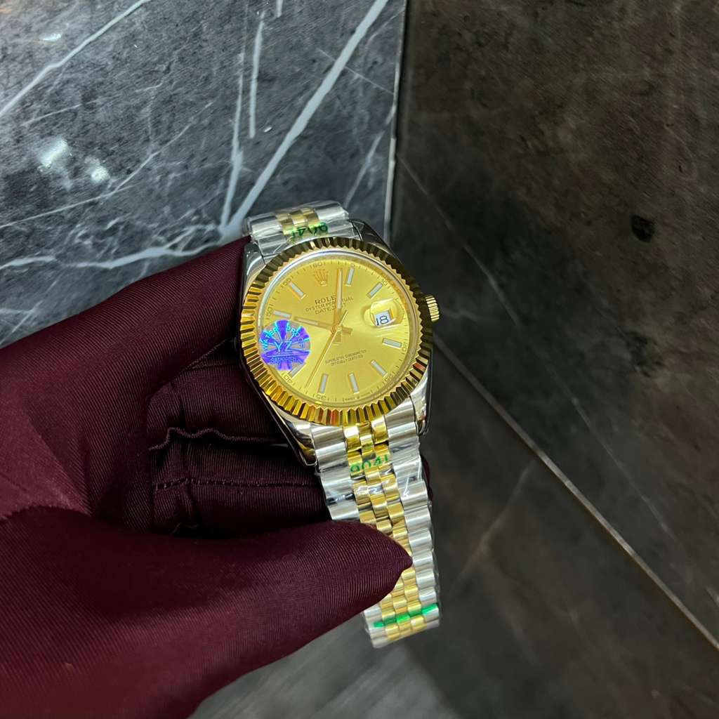 Rolex Two-Tone Watch with a Gold Colored Fluted Bezel